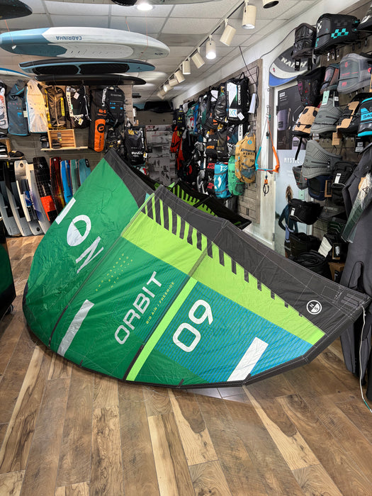 Used North Orbit 9m kite in Super Lime, bright lime inflatable canopy and visible kite frame.
