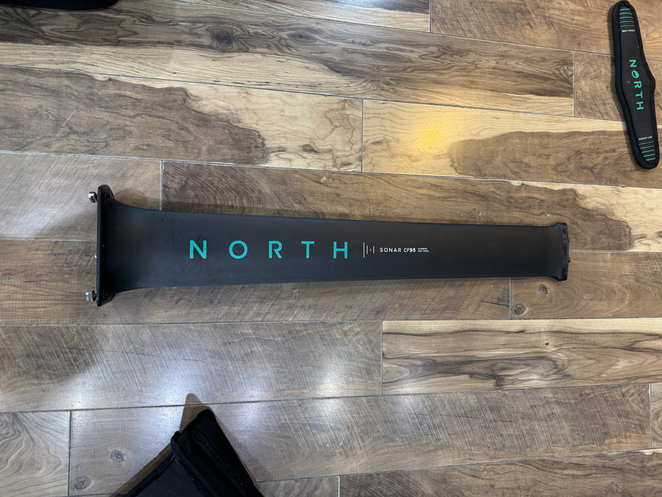 Used North Sonar Carbon Mast Edition CF 95 foil set with carbon mast for water sports.