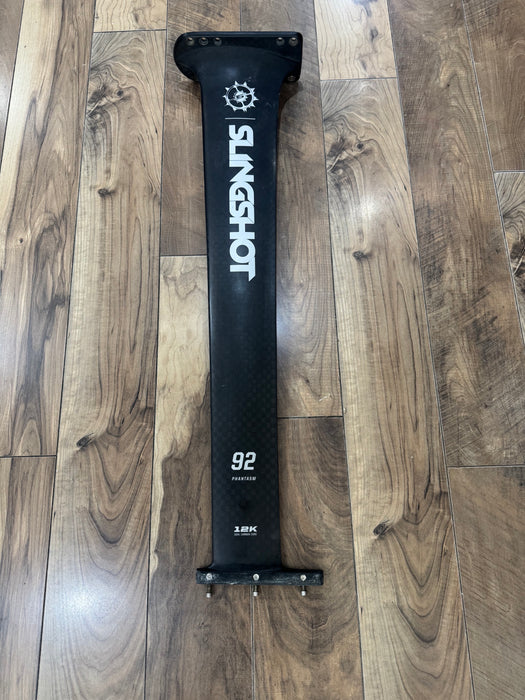 Used Slingshot Phantasm 92cm carbon mast foil set photographed on a plain background