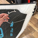 2026 Cabrinha Switchblade 10m used kite in blue and black, shown inflated outdoors