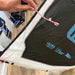 Used Cabrinha Switchblade 10m kite, black and white canopy shown from above