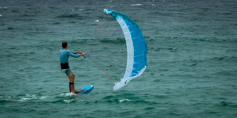 Beginner Wing foiler about to get on foil